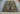 Knotted wool silk Mamluk rug styled on hardwood floor – luxurious Oriental look