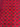 Detail of traditional hand-knotted Persian pattern on red rug