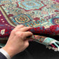Hand-knotted wool and silk Turkish Mamluk rug shown in-hand