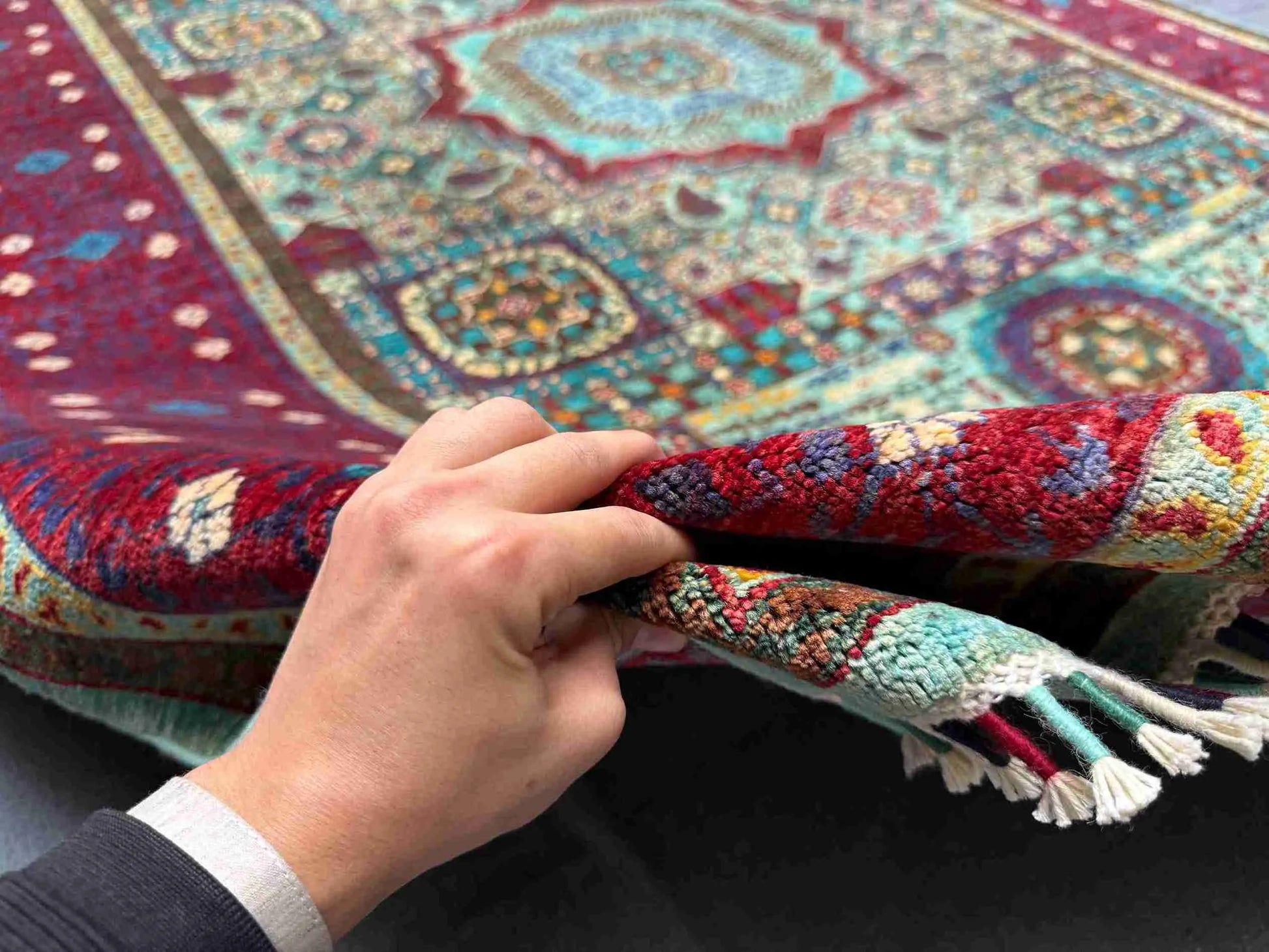 Hand-knotted wool and silk Turkish Mamluk rug shown in-hand