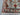 Edge details of knotted handmade wool rug – floral design