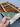 Close-up of authentic handmade Gabbeh wool silk rug held in hands