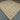  Handmade geometric Turkish rug styled on floor – knotted wool with earthy tones.