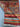 Corner detail of folded small Afghan wool rug