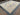 Blue and beige handmade rug laid flat in spacious room