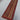 Floor display of handwoven striped wool runner in ethnic colors