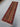 Floor display of handwoven striped wool runner in ethnic colors