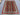 Striped Turkish kilim shown on the floor for traditional room styling