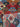 Edge detail of folded geometric handwoven rug