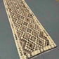 Handwoven Turkish runner rug floor view – neutral palette perfect for modern rustic decor.