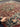 Detailed fabric texture of Red & Black handmade Heriz Persian rug in hands