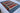 Gabbeh wool area rug 7x11 blue red beige tribal geometric design