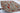 Kazak wool area rug 7x10 ivory tribal geometric design