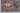 Kazak wool area rug 7x10 ivory tribal geometric design