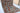 Kazak wool area rug 7x10 ivory tribal geometric design