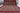Tribal wool area rug 10x13 beige, blue, red tribal geometric design