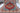 Heriz 7x11 red blue wool area rug with tribal geometric rug design