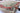 Oriental wool area rug 8x10 red green beige tribal geometric design