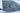 Tribal wool area rug 7x10 blue, red, green tribal geometric design