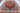 Heriz 7x11 red blue wool area rug with tribal geometric rug design