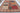 Patchwork 10x13 multicolor wool area rug with tribal geometric rug design