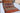 Gabbeh 6x8 colorful earth tone wool area rug with tribal geometric rug design