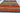 Landscape 7x10 red wool area rug with tribal geometric rug design