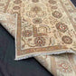 Folded view showing backside texture of handmade 5x7 Chobi rug.