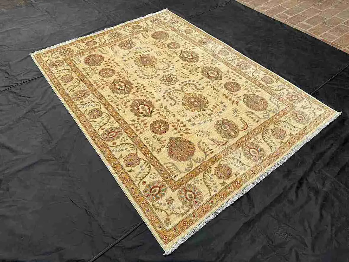 Handmade ivory Chobi rug 5x7 ft placed on living room floor – Persian decor