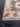 Corner detailing of the pastel wool Khotan runner rug