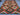 Wool Kilim rug 5x6.8 ft in natural light – red, green, and black tribal design.