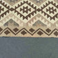 Detail of beige and brown colors in handmade kilim rug