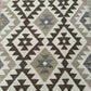 Detail of beige and brown colors in handmade kilim rug