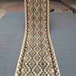 Full view of 2x9 flatweave Kilim runner rug in neutral colors