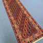 Turkish kilim runner rug placed in a bohemian-style hallway
