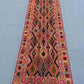 Bohemian Kilim wool runner on beige floor