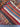 Close-up of folded rug showing the wool knots and soft weave