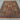 Knotted wool and silk rug in earthy color palette placed on home floor