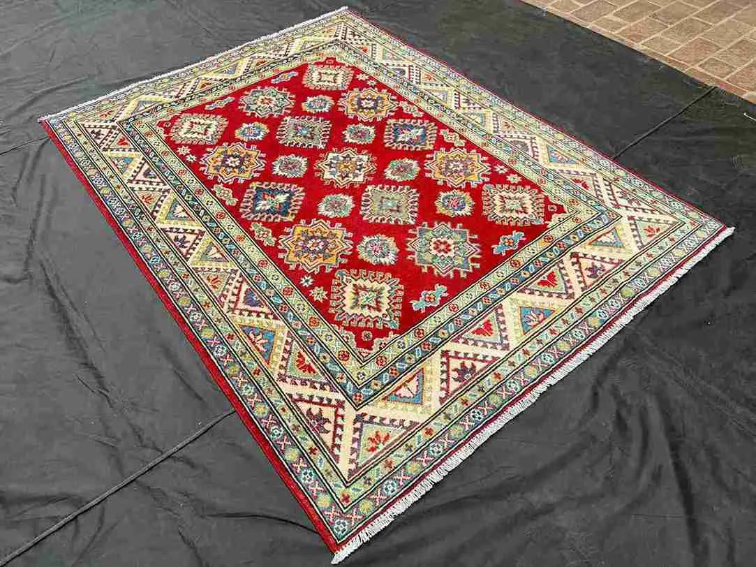 Luxury handmade wool area rug on hallway floor