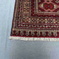 Corner detail of luxury handmade Oriental rug – Afghan Turkish design