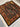 Detailed folded edge of knotted wool-silk Persian rug