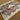 Folded handmade silk rug displaying texture and quality