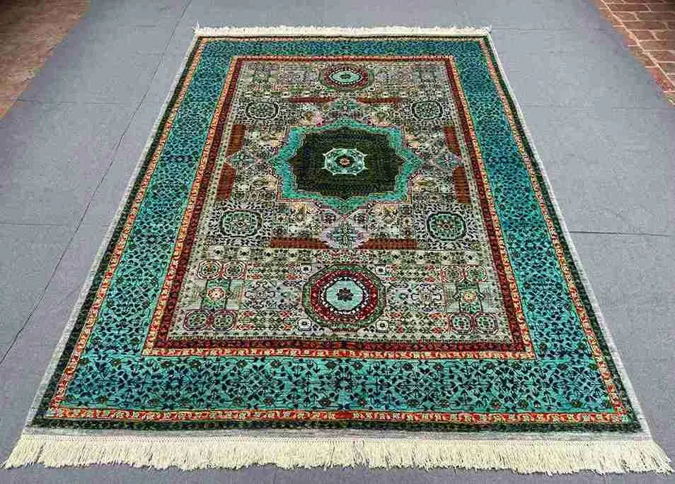 Full room layout featuring Persian-style Mamluk Oriental rug – 5x8