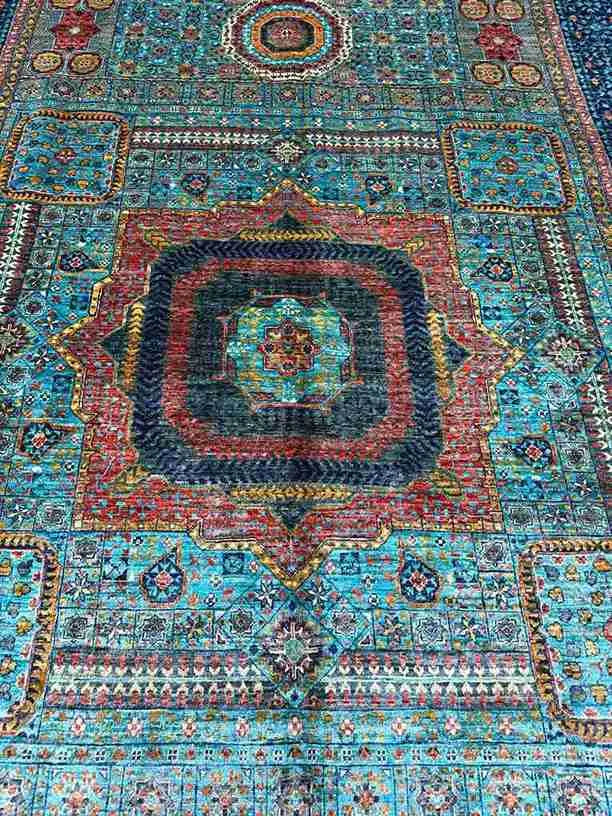 Close-up of vintage-inspired pattern on 6x9 handmade Mamluk rug – wool silk detail