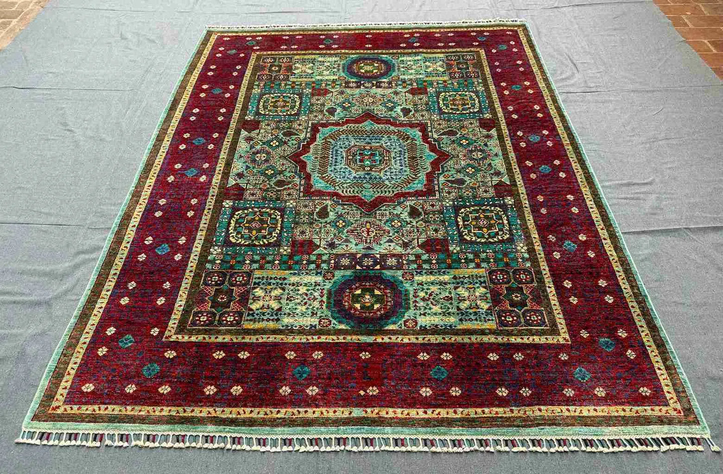Room decor with 6x8 handmade Mamluk rug in warm colors