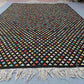 Multicolor flatweave Turkish Kilim rug displayed on floor in modern rustic home.