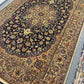 Persian Nain rug under bed – traditional bedroom decor