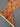 Folded view of Orange Persian Sultani wool runner rug