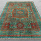 Persian-style Mamluk carpet on living room floor with traditional decor
