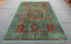 Persian-style Mamluk carpet on living room floor with traditional decor